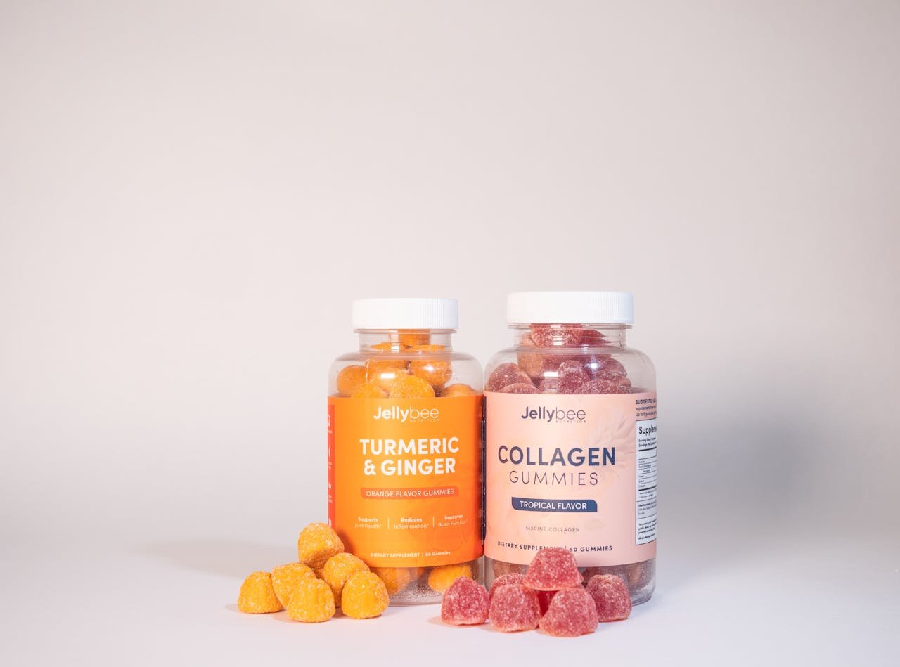 about-us Vibrant product image of Jellybee Turmeric & Ginger and Collagen gummies on a white surface.